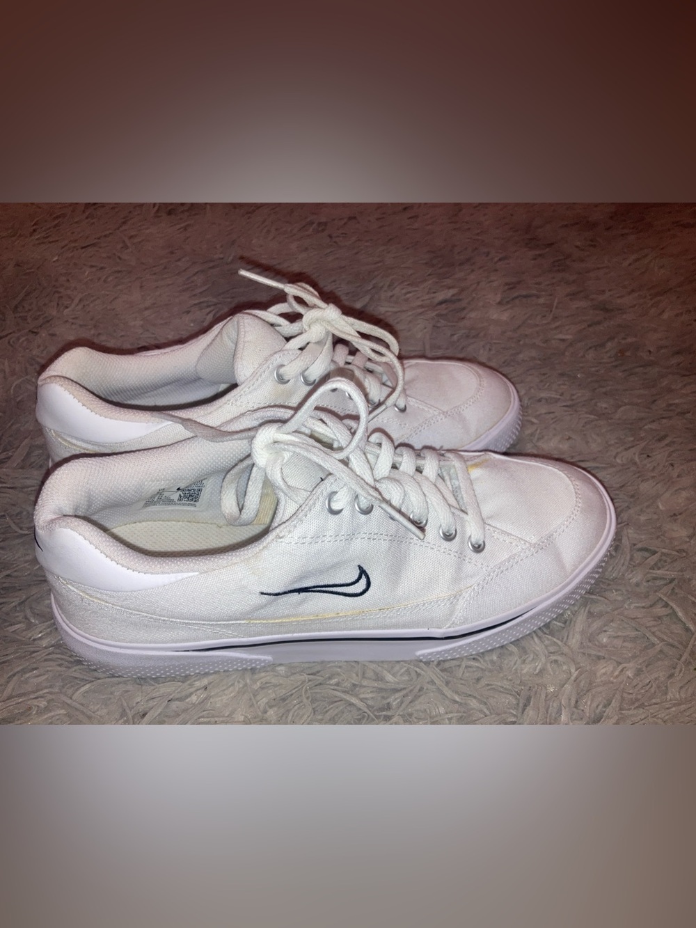 Nike Women’s White Canvas Low-Top Sneakers with Black Swoosh